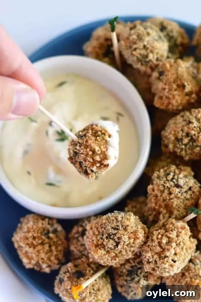 Sausage stuffed fried olives plated