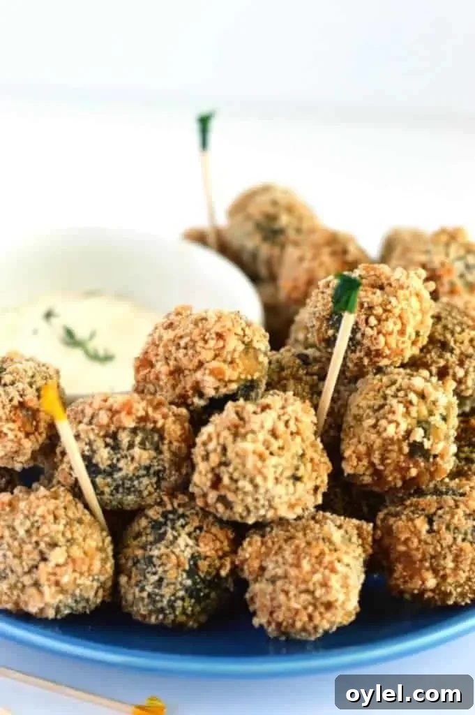 Sausage stuffed fried olives closeup