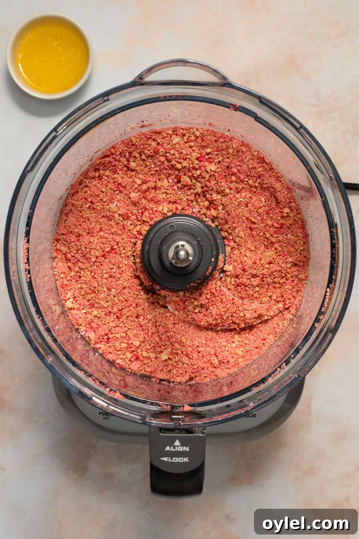Strawberry Crunch Cupcakes Recipe with Crumble Topping 10 Crumbled Golden Oreos and freeze-dried strawberries in food processor.