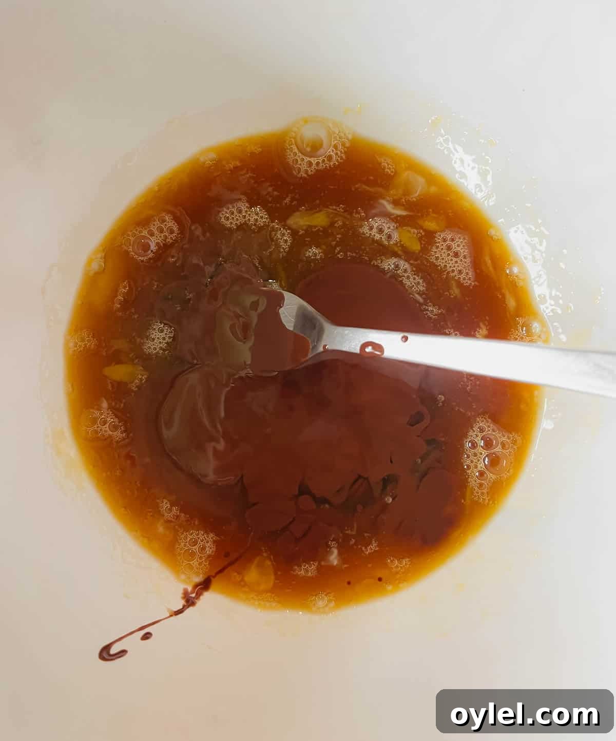 Melted chocolate added to egg mixture.