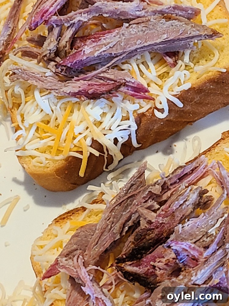 How to Make Brisket Grilled Cheese on a Blackstone Griddle 2 Brisket Grilled Cheese On The Blackstone Griddle is an amazing leftover brisket recipe! Using smoked brisket adds an amazing flavor to grilled cheese! Either use shredded brisket or brisket slices to make these. You can add different cheeses to change up the flavor like Monterey Jack or Pepper Jack cheese!