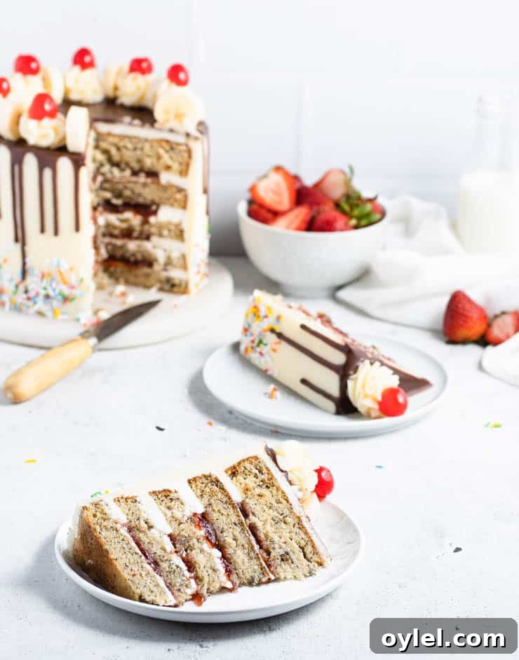 slices of banana split cake on plates in front of slice cake