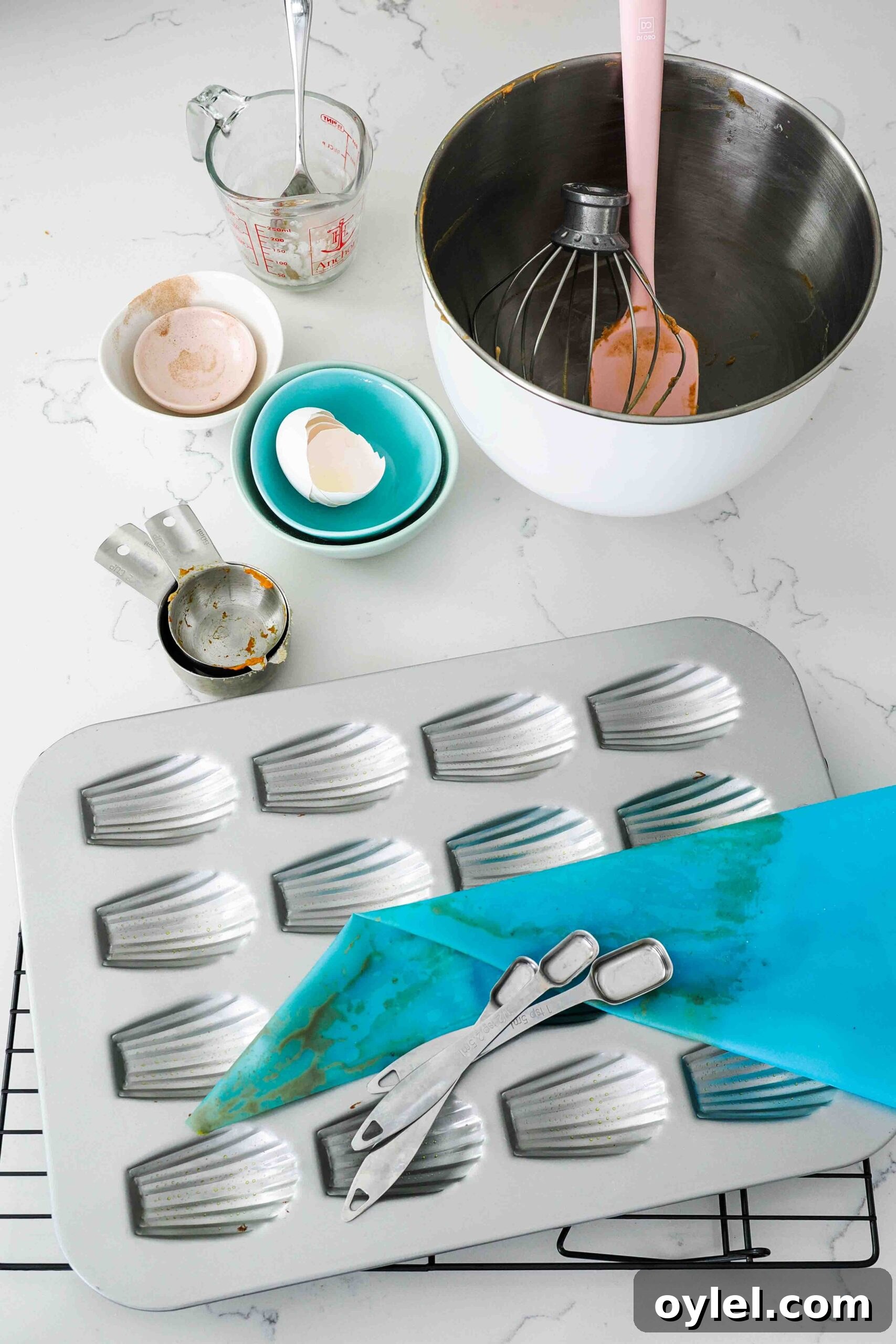Dishes used to make pumpkin madeleines.