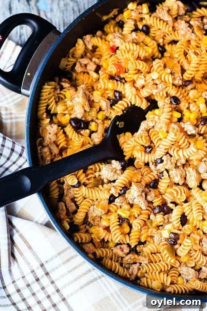 Mexican One Pan Pasta - Super fast and easy Mexican one pan pasta - it takes less than 25 minutes to have a flavourful, one pan pasta dish on the table that everyone will love!