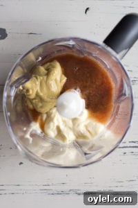 date paste, mayo, mustard in a food processor