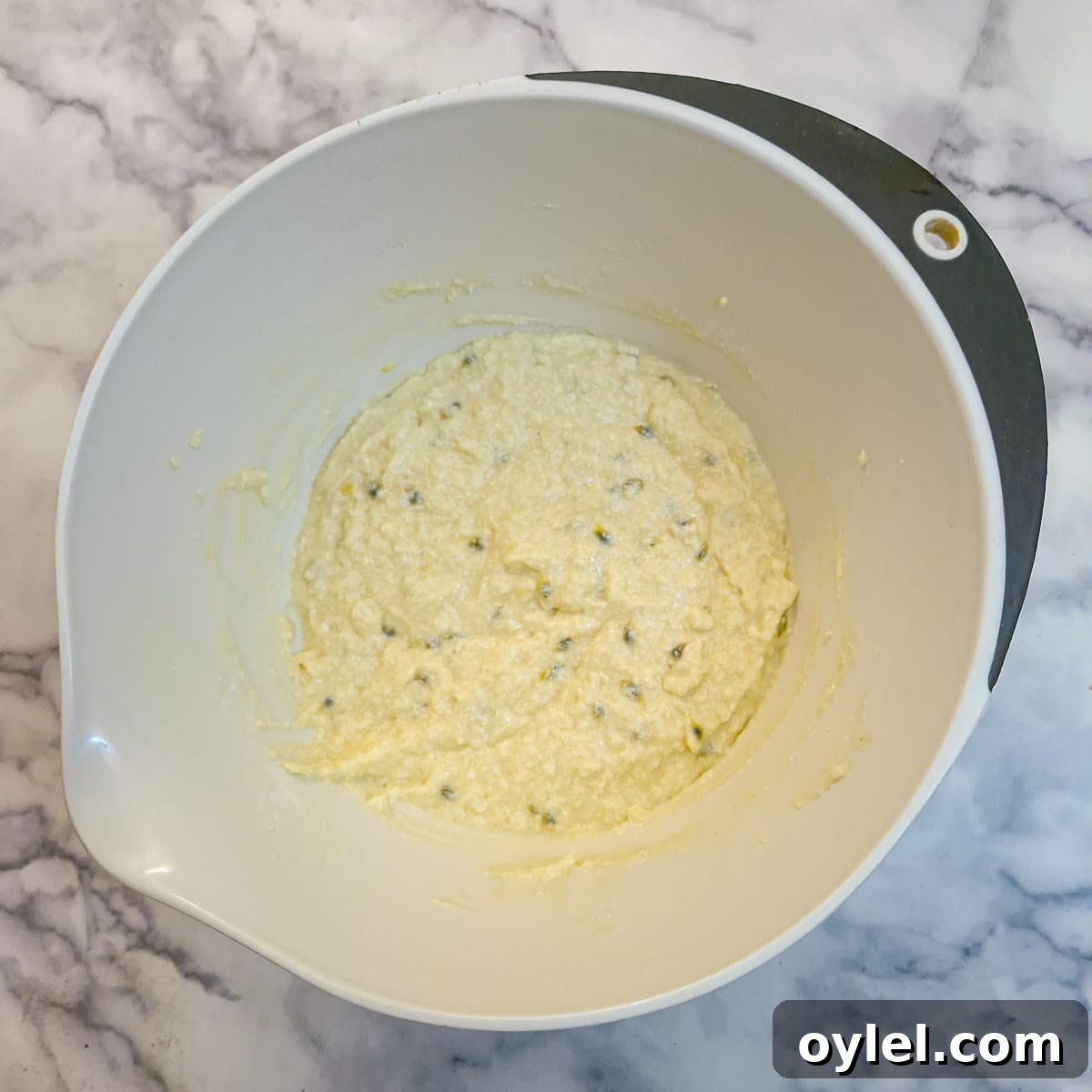 Flour coconut and milk added to the batter.