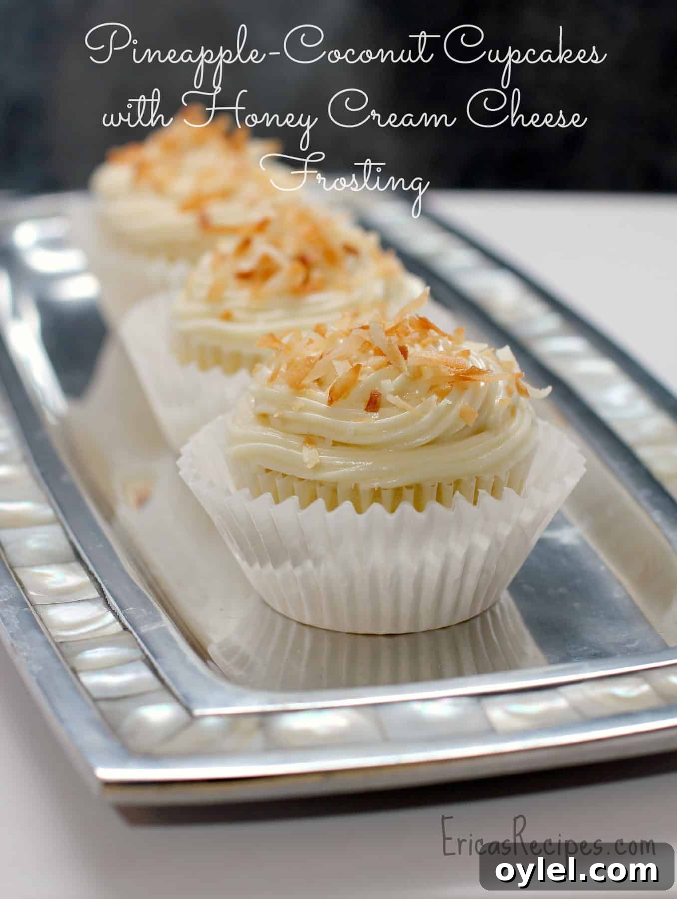Honey Cream Cheese Frosted Pineapple Coconut Cupcakes 8 Fluffy, angelic Pineapple Coconut Cupcakes with Honey Cream Cheese Frosting. These dream-like cupcakes are so luscious and decadent, with a perfect balance of sweet. #dessert #recipe #food #pineapple #coconut #cupcake #honey #creamcheese #frosting