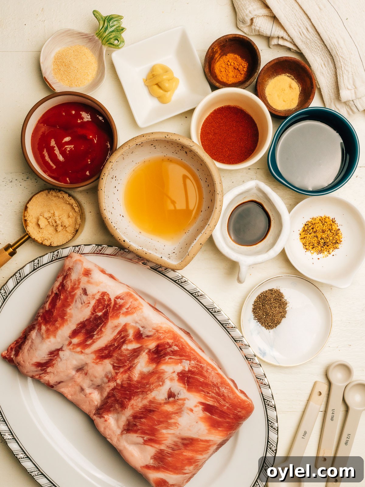Fall-Off-the-Bone Spare Ribs Recipe 2 Ingredients for Spare Ribs laid out on the counter.