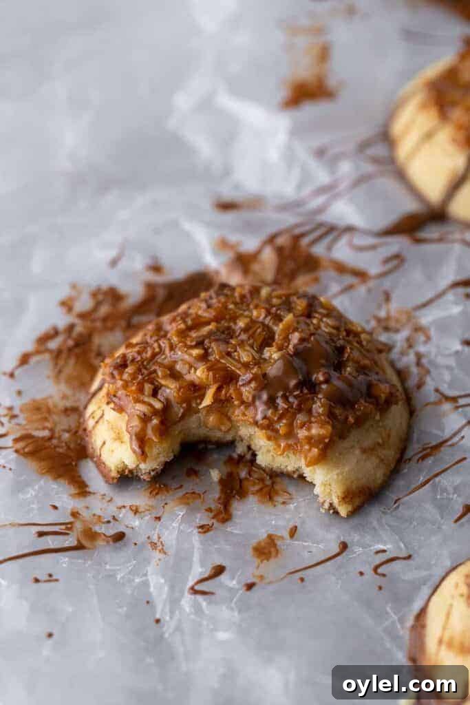 Coconut fudge cookie with a bite taken out