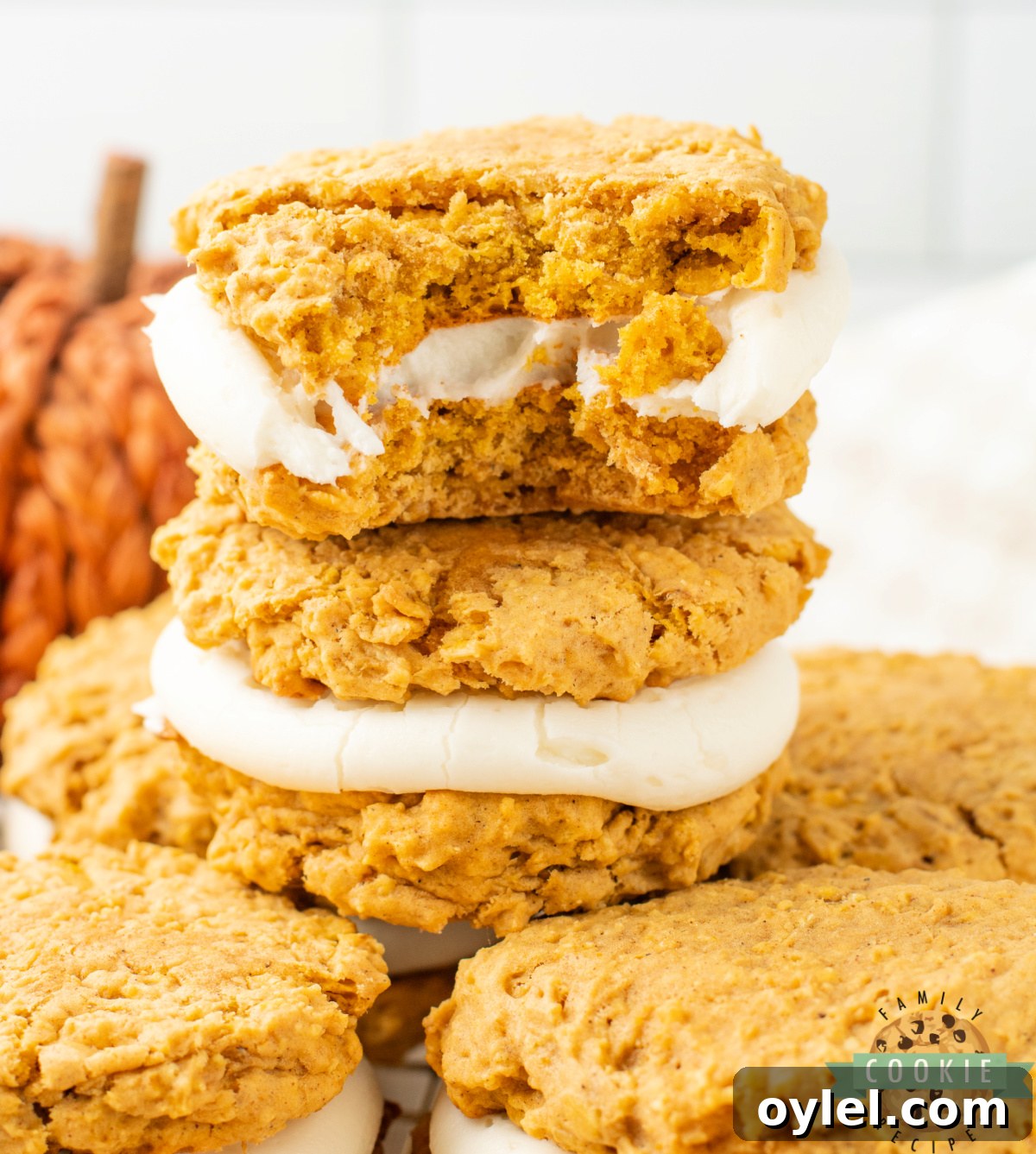 These Pumpkin Oatmeal Cream Pies are soft, chewy, and spiced with pumpkin, cinnamon & nutmeg, then filled with sweet cream cheese frosting.