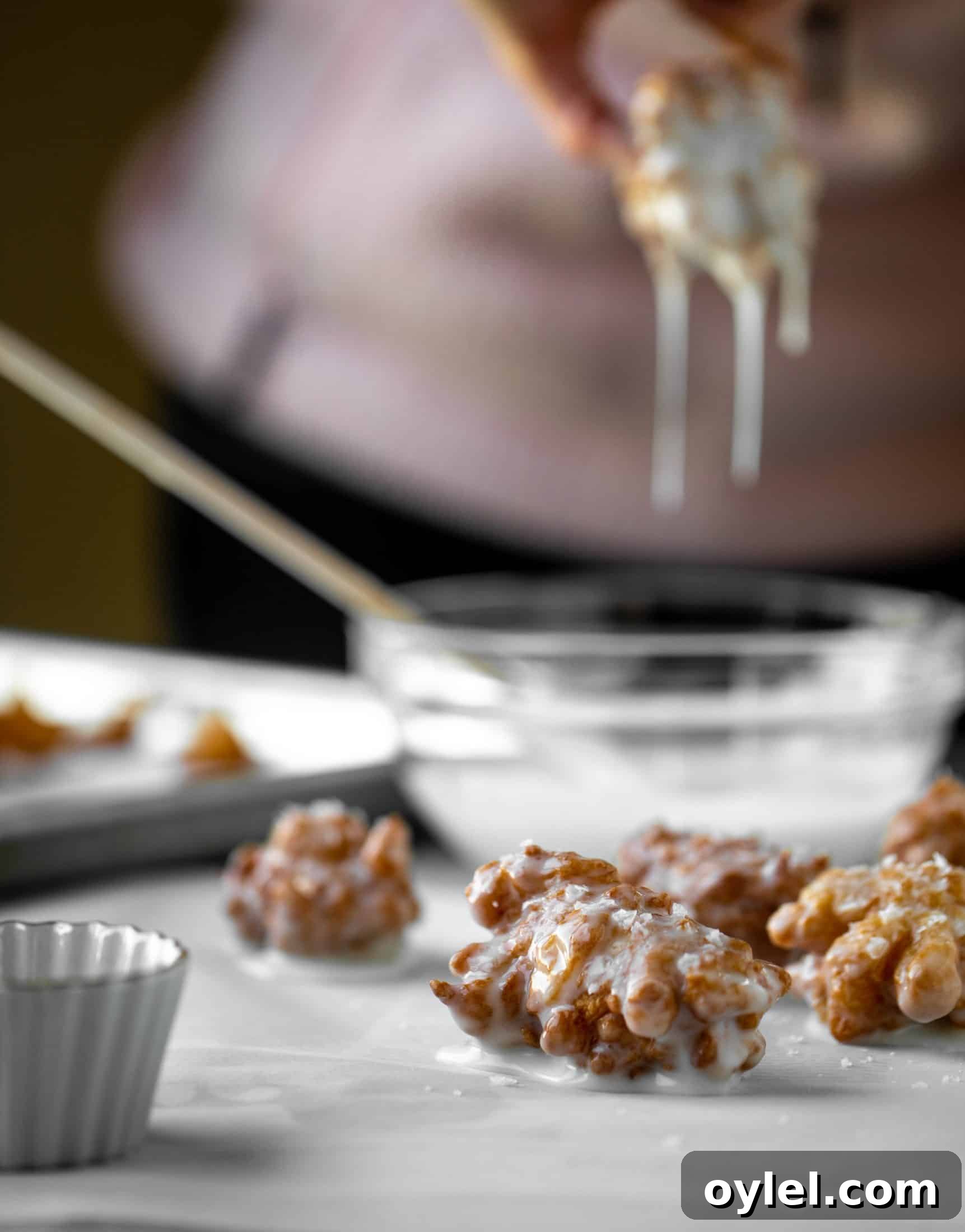 These salted apple fritters use honeycrisp apples and flaked sea salt for a fall flavor explosion. These are the best treat ever!