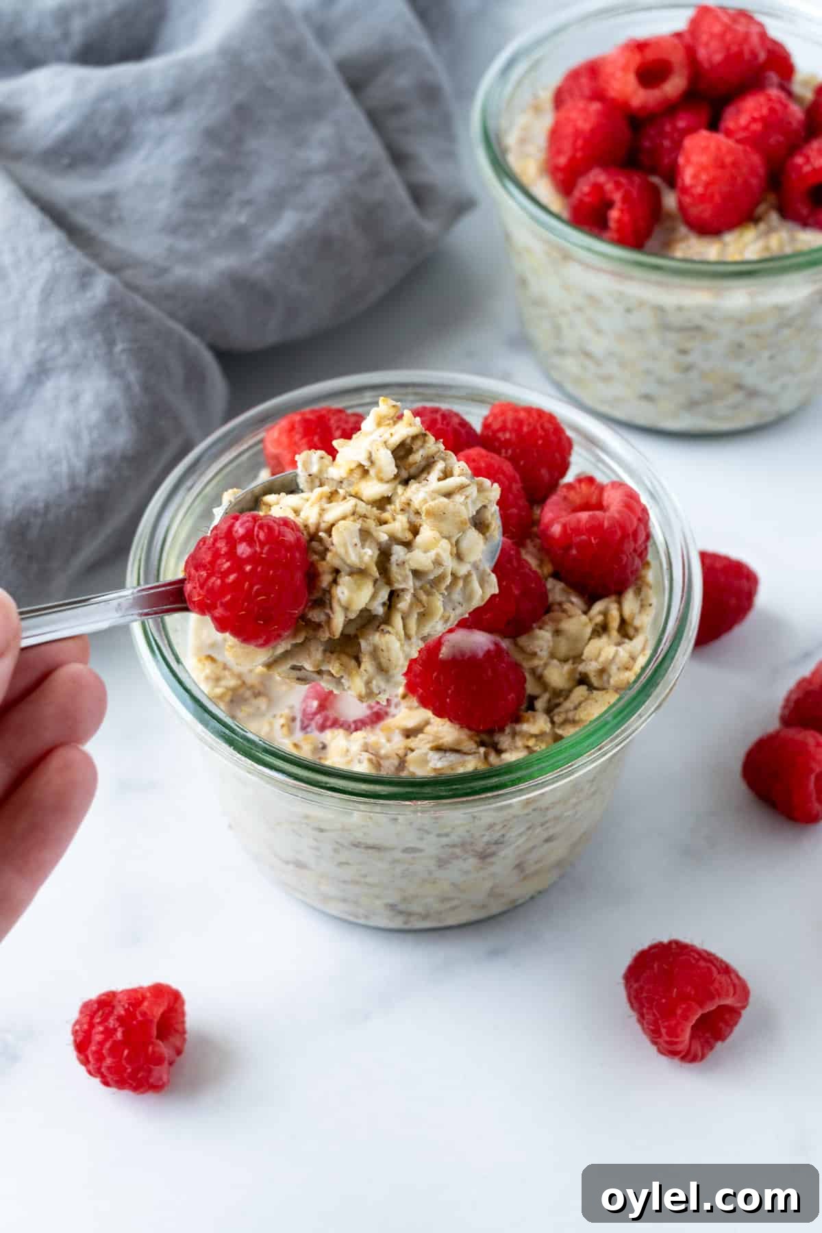 Creamy Raspberry Overnight Oats Recipe 6 A spoonful of raspberry overnight oats.