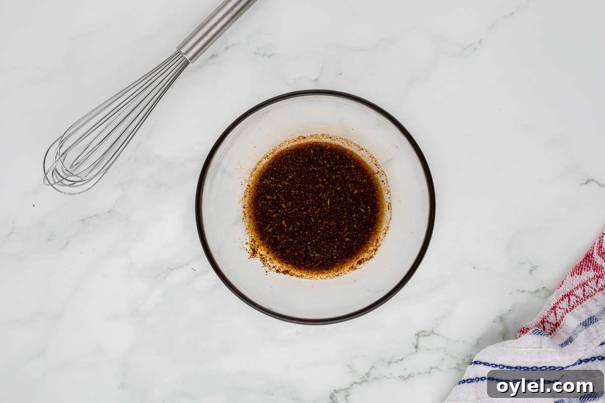 spices and oil mixed together in bowl.