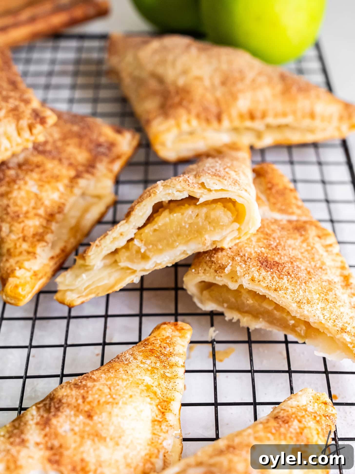 Easy apple turnovers cut in half to show the apple filling.
