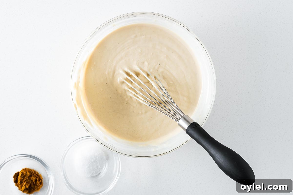 Lemon Tahini Sauce Recipe: 5 Flavor Variations 6 Smooth vegan tahini sauce once enough water is added and the sauce emulsifies.