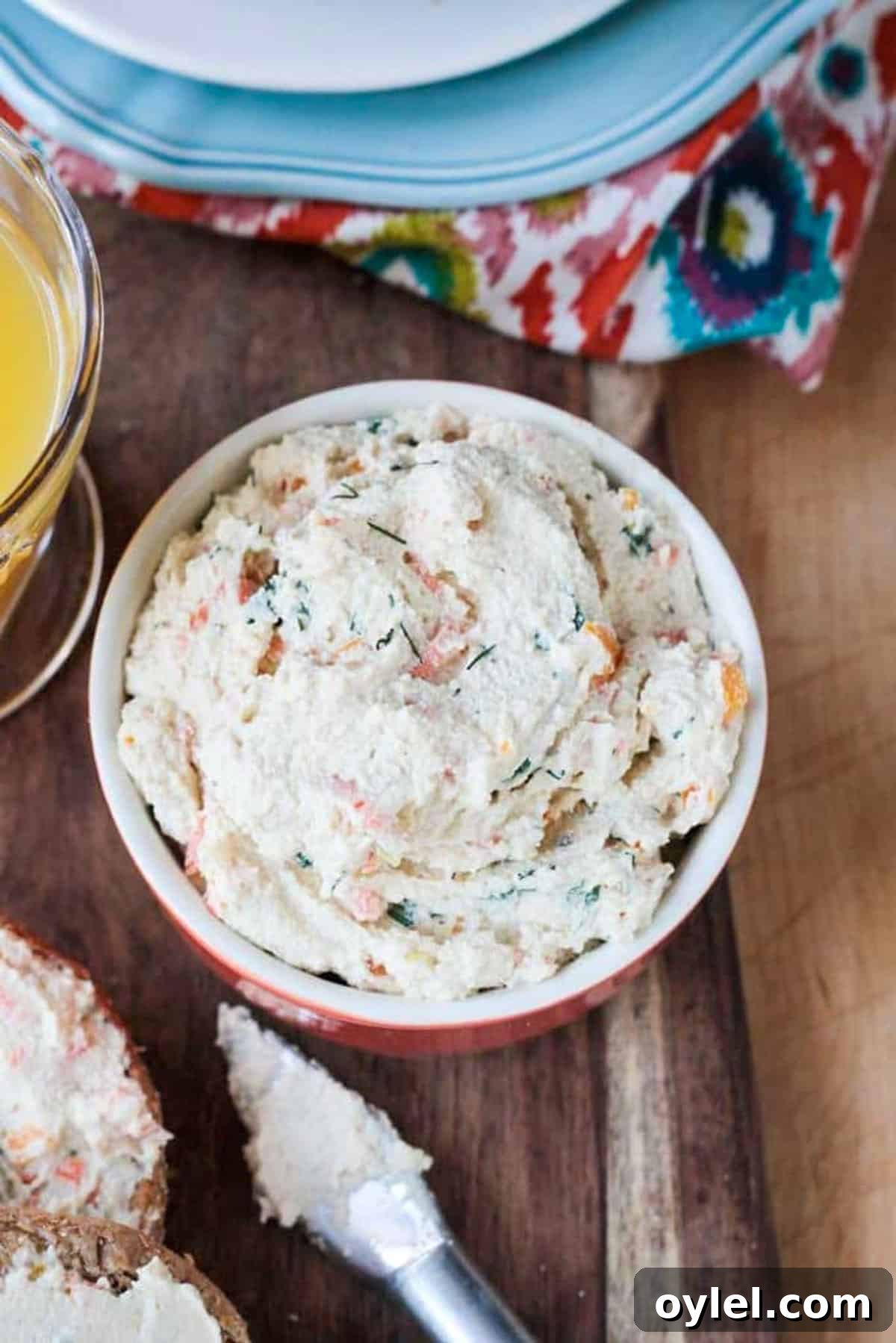 Overhead view of a serving bowl of veggie cream cheese.