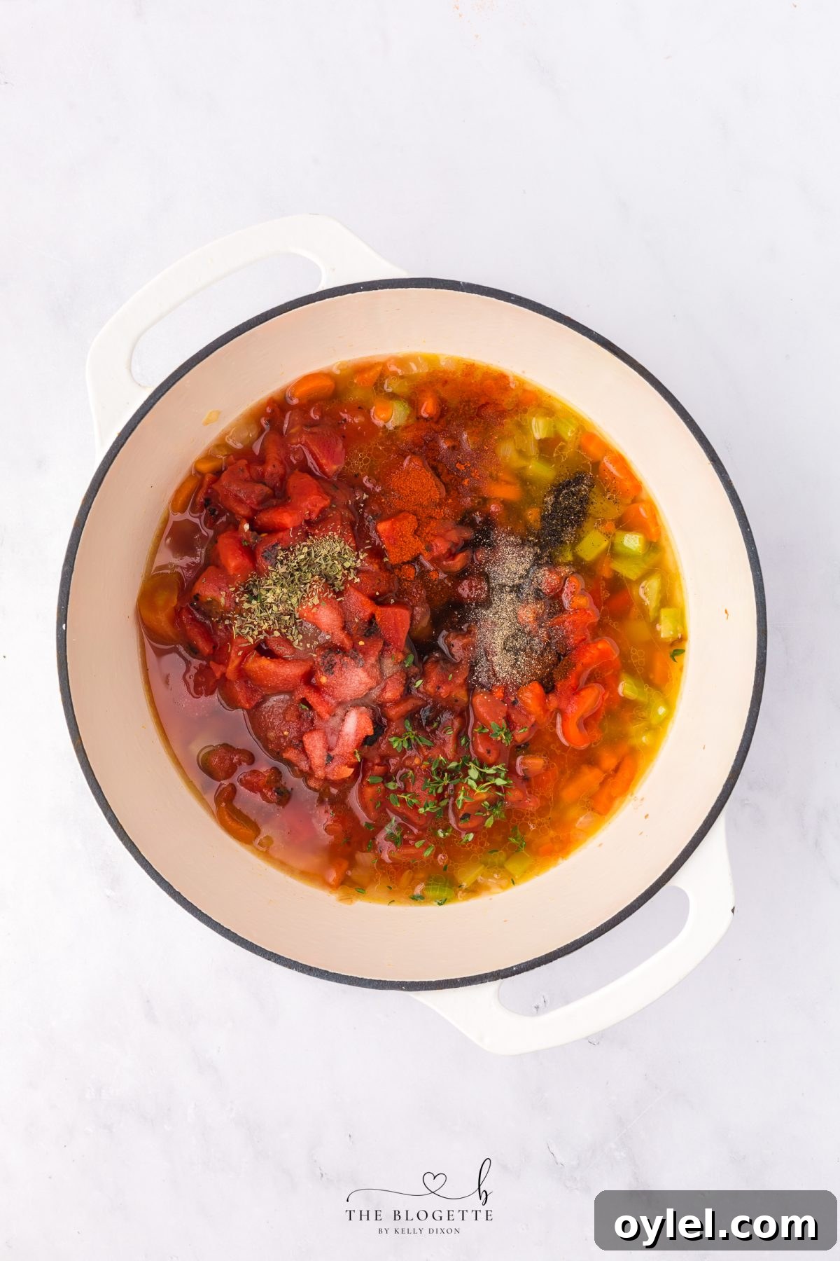Creamy Roasted Tomato Bisque Recipe 6 Add tomatoes and seasoning