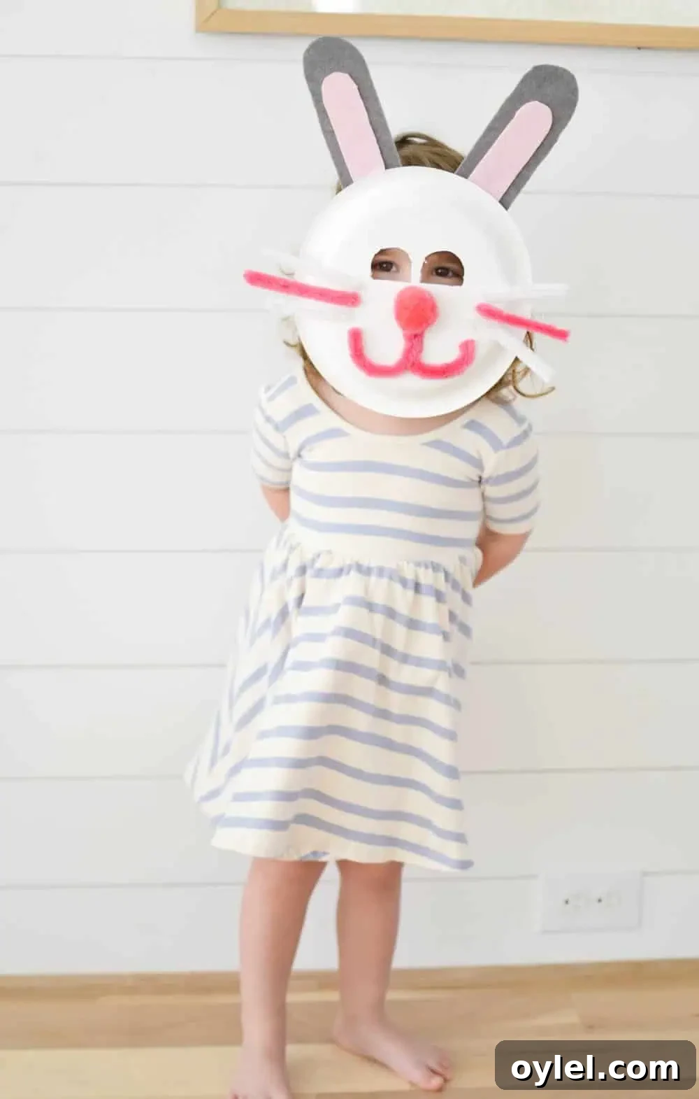 DIY Easter Bunny Masks for Kids: Printable No-Sew Templates 3 a girl wearing easter bunny mask