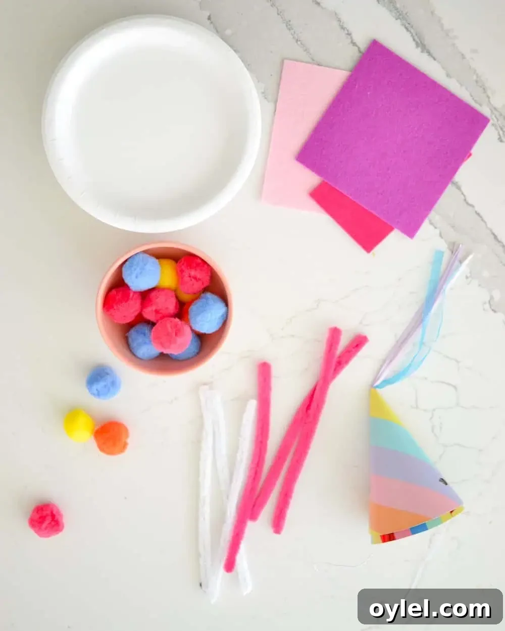 DIY Easter Bunny Masks for Kids: Printable No-Sew Templates 6 colorful craft supplies laid out for an easter bunny mask