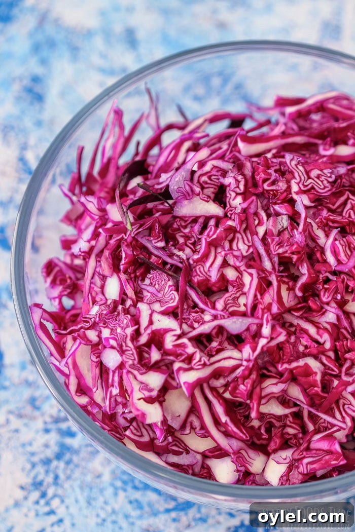 Tender Braised Red Cabbage in the Instant Pot 4 Shredded red cabbage in the glass bowl.