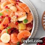 overhead shot of a fruit salad in a a bowl