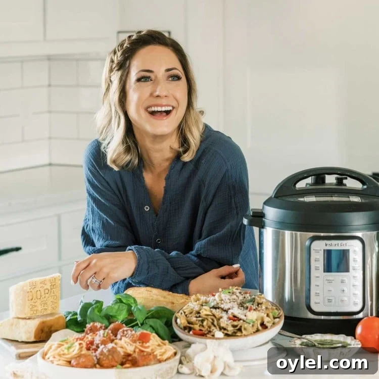 Blogger in a kitchen with dishes of food