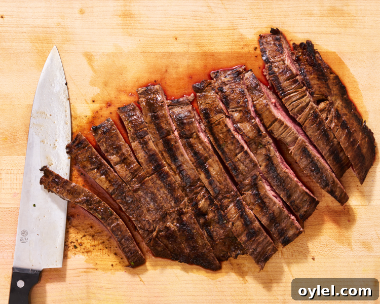 Slicing flank steak against the grain